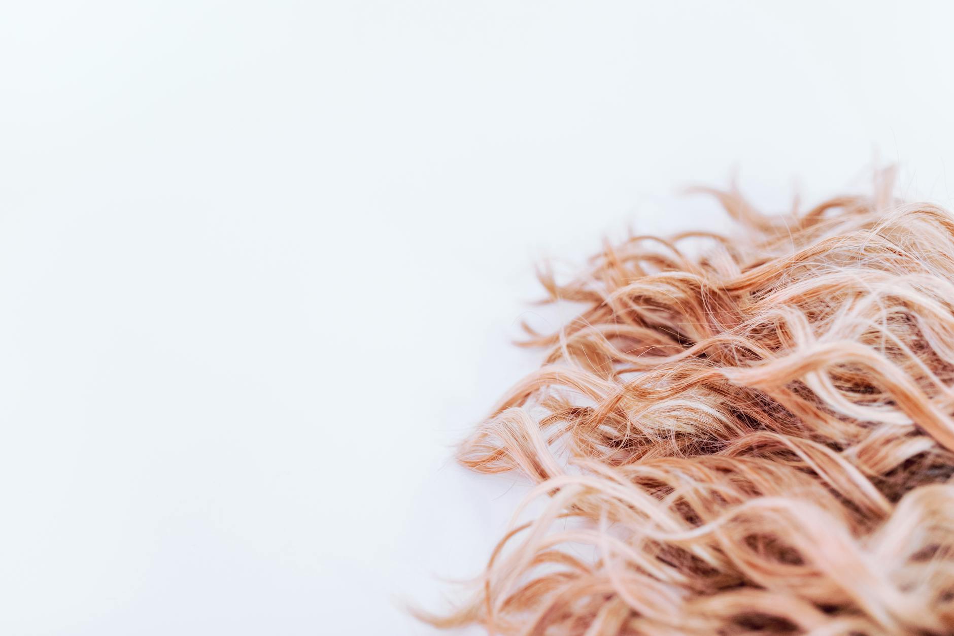 Postpartum Hair Loss: Why It Happens, When It Stops, and How to Regrow It Faster