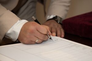 trump signs agreement — Photo by Boris Hamer on Pexels